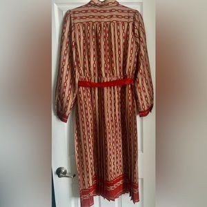 Ann Taylor dress size 6. New never worn. Red and beige in color. Pleated skirt.
